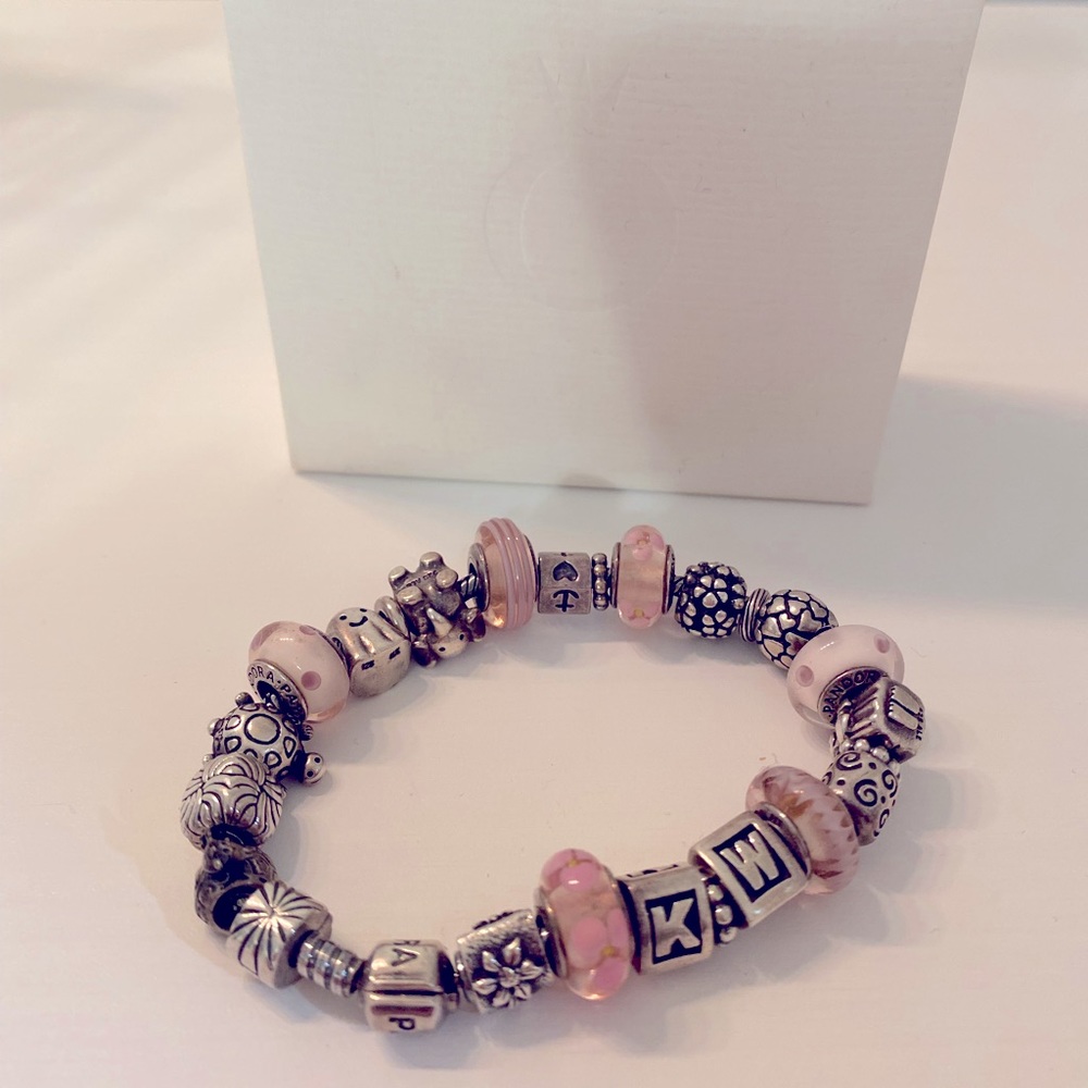 Gorgeous Pandora Bracelet with many retired beads + morano glass!